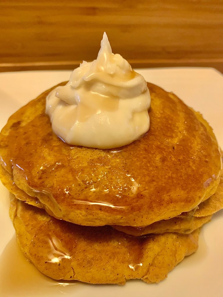 pumpkin pancakes with butterscotch syrup and amaretto cream cheese frosting 