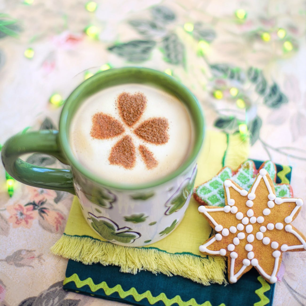 green ceramic mug on the table